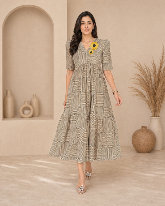 Black horizontal and vertical srtripes frock with sunflower aplique