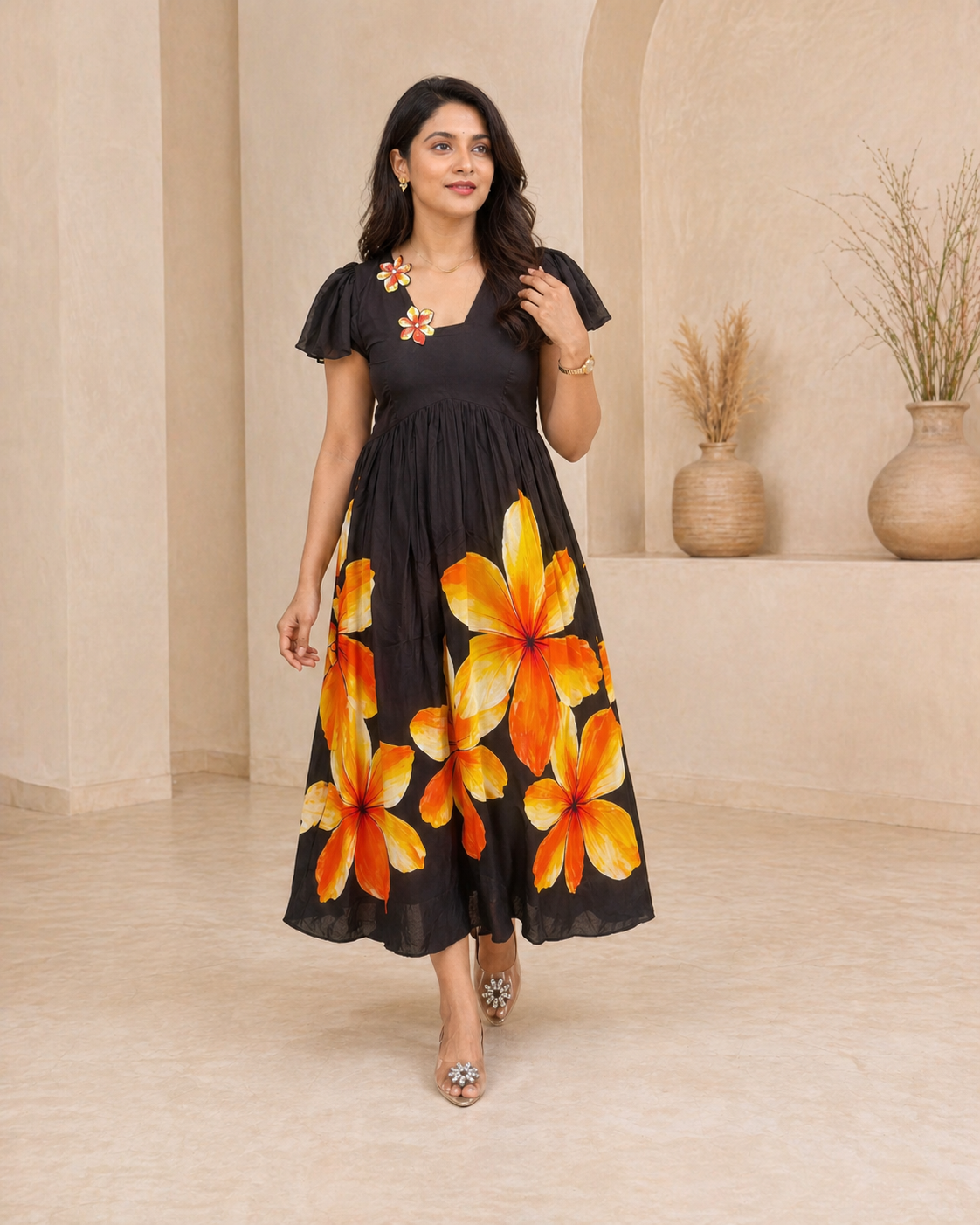 Black frock with hand embroidery and floral motif frock styling