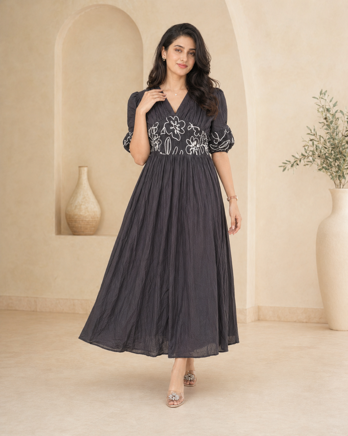 Black cotton frock with sleek thread work detailing styling