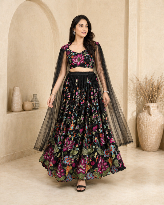Black lehanga with angel sleeves and hand embroidey