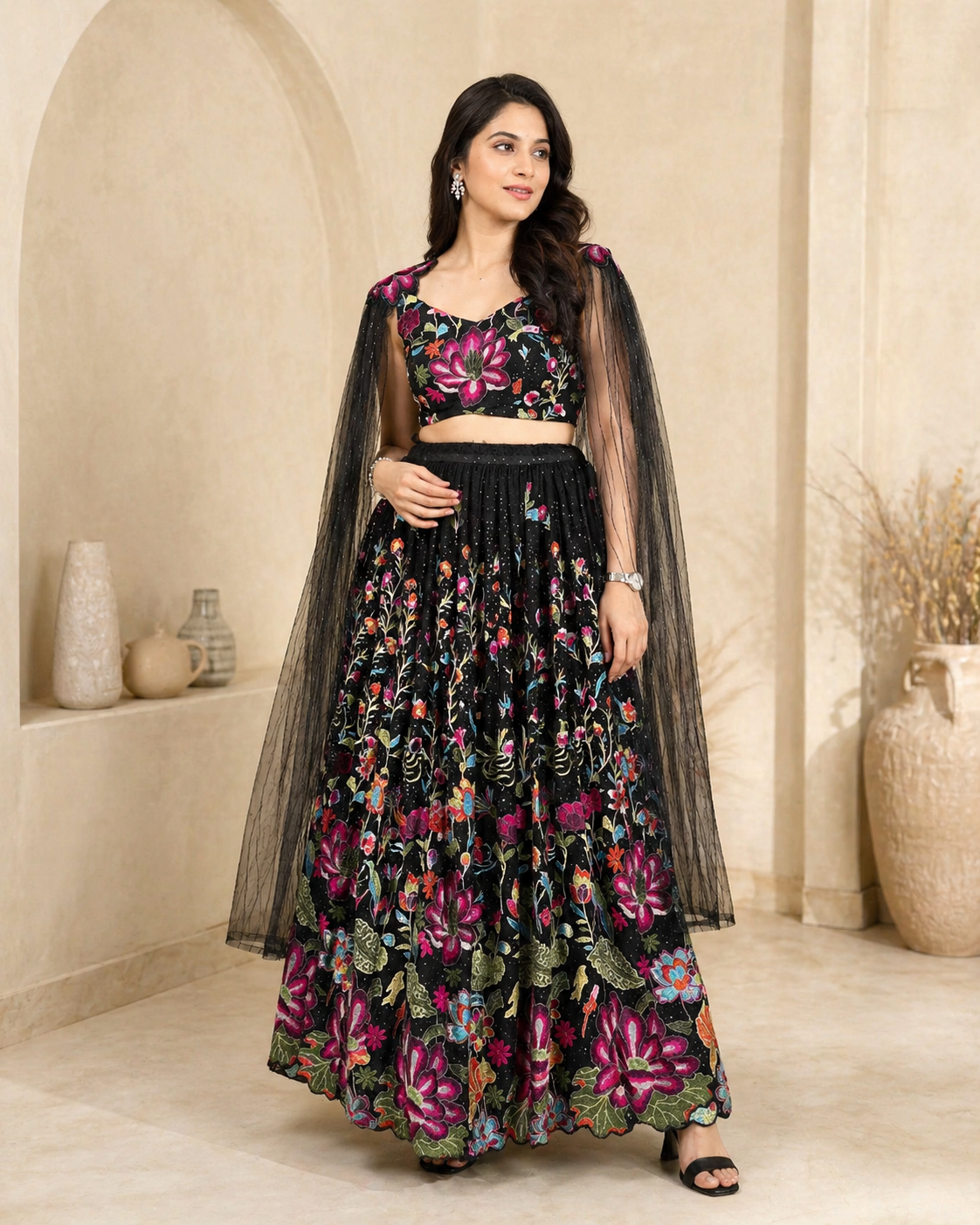 Black lehanga with angel sleeves and hand embroidey styling