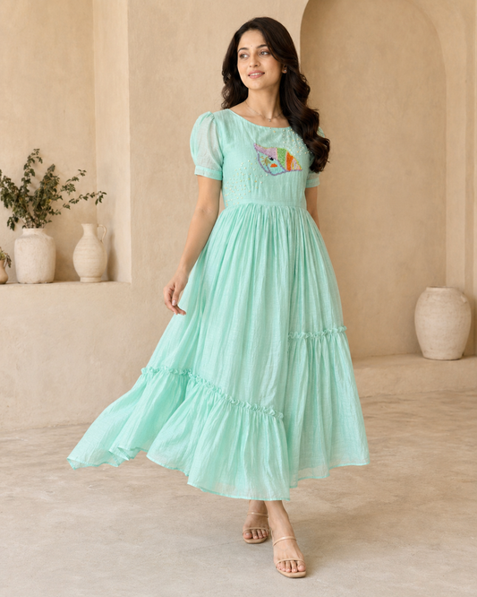 Pastel green frock with hand embroidery motif