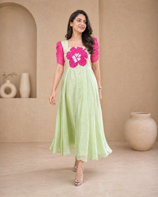 Lenin pista green frock with pink hibiscuss motif