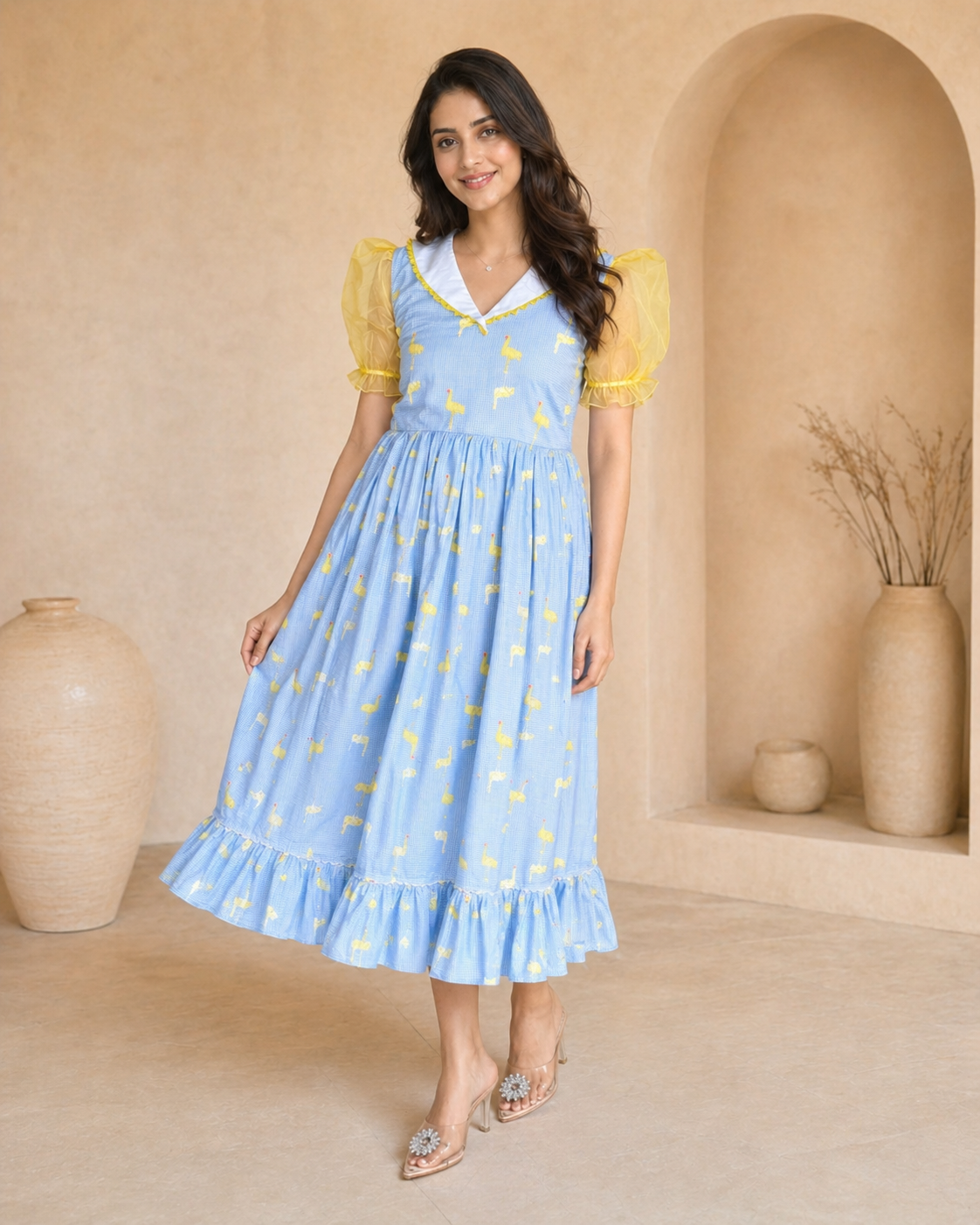 Powder blue cotton frock with swan motif thread work styling